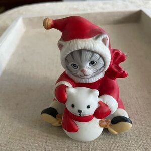 Cucumber Kitty by Schmid. She made a snow kitty